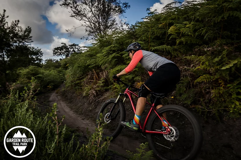 a real outdoor enthusiast mountainbiking on a muddy trail